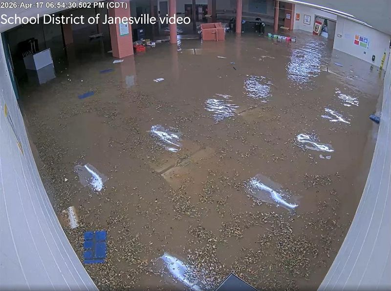 Video shows flood waters completely submerging lunch tables at a cafeteria in Washington Elementary School in Janesville on April 17, 2026.