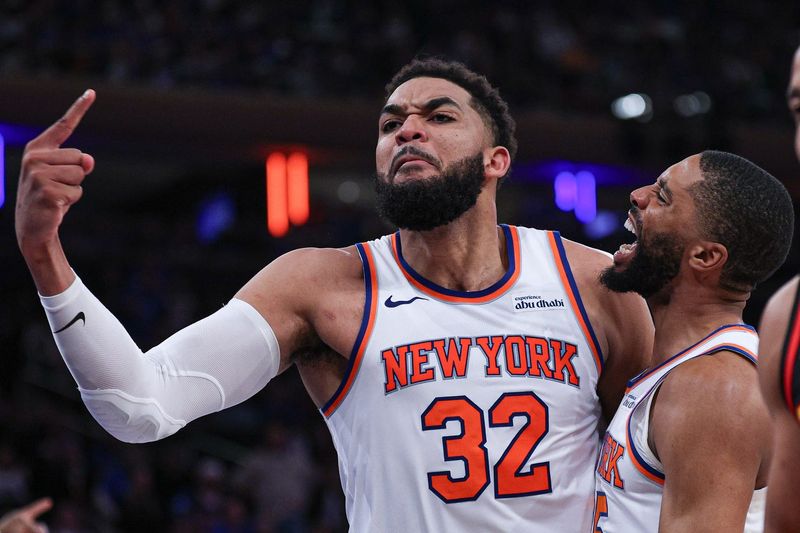 Apr 18, 2026; New York, New York, USA; New York Knicks center Karl-Anthony Towns (32) reacts during the fourth quarter of the 2026 NBA Playoffs against the Atlanta Hawks at Madison Square Garden. Mandatory Credit: Vincent Carchietta-Imagn Images