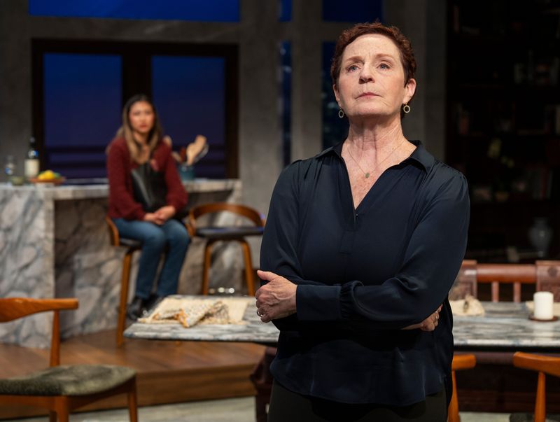 Mai Abe and Laura Gordon perform in "Dinner With the Duchess," staged by Next Act Theatre.