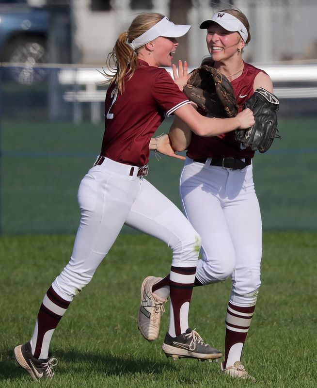 Wiineconne High School’s Neela Gardner (8) and Sayge Pelletier celebrate an out against Xavier High School during their softball game on Thursday, April 23, 2026 in Appleton, Wis. Winneconne defeated Xavier 8-6.
Wm. Glasheen USA TODAY NETWORK-Wisconsin