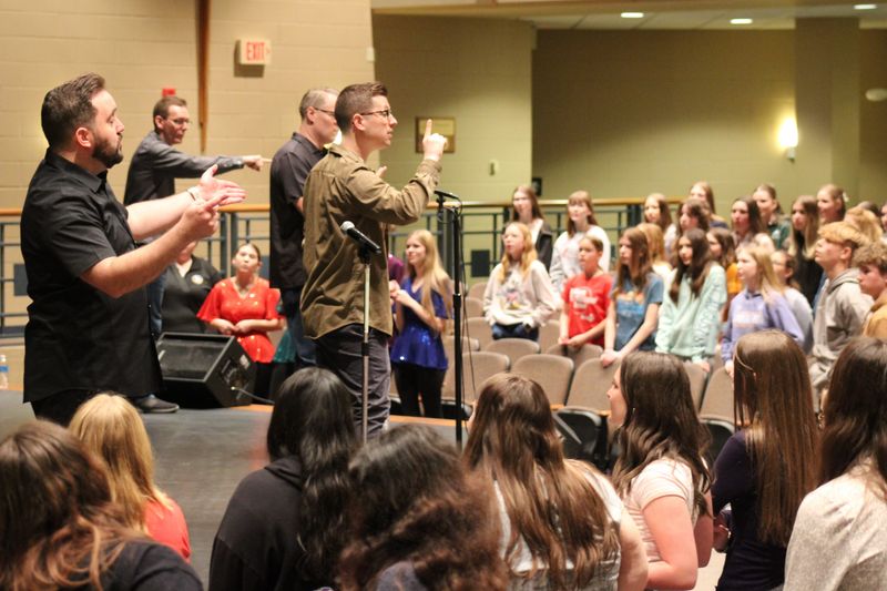 Instant Classic — the 2015 International Champion Barbershop Quartet from Indianapolis — visited Manitowoc on Friday, April 17, 2026. The quartet led hands-on workshops at Roncalli High School and Valders High School.