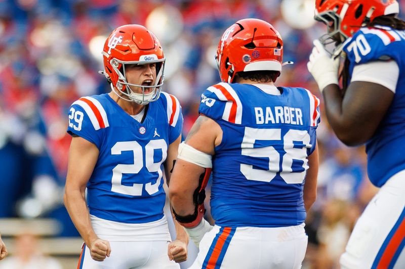 Florida kicker Trey Smack (29) reacts with Florida offensive lineman Austin Barber (58) after making a 54-yard field goal against Mississippi State in October 2025.
