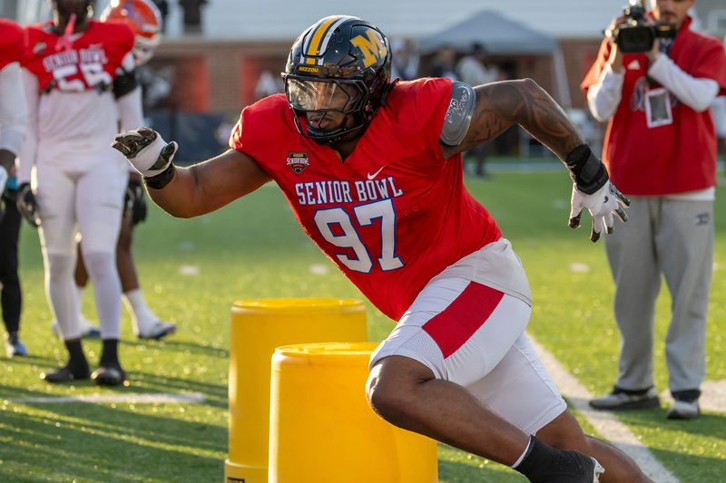 Jan 29, 2026; Mobile, AL, USA; American defensive tackle Chris Mcclellan (97) of Missouri of Boston College works in a drill during American Senior Bowl practice at Hancock Whitney Stadium. Mandatory Credit: Vasha Hunt-Imagn Images