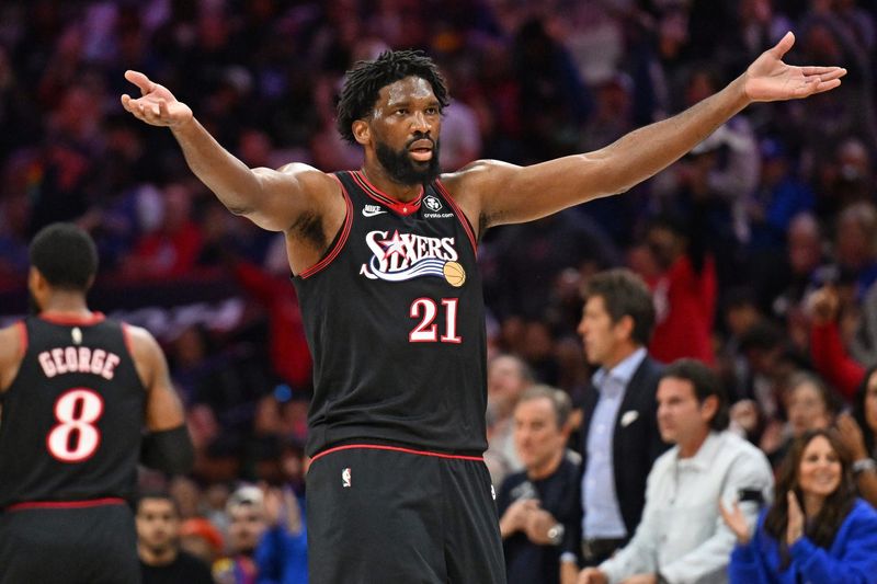 Philadelphia 76ers center Joel Embiid (21) encourages the crowd against the Boston Celtics during the first half at Xfinity Mobile Arena in Philadelphia, Pennsylvania, on April 26, 2026.