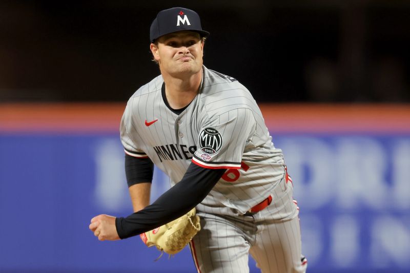 Minnesota Twins starting pitcher Connor Prielipp (61) follows through on a pitch against the New York Mets during the third inning at Citi Field in Queens, New York.
