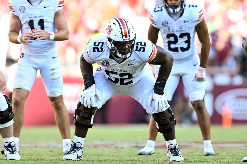 Sep 27, 2025; College Station, Texas, USA; Auburn Tigers offensive lineman Dillon Wade (52) lines up against the Texas A&M Aggies during the second half at Kyle Field. Mandatory Credit: Maria Lysaker-Imagn Images
