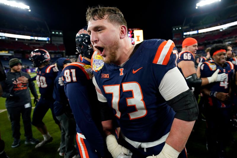 Illinois offensive lineman Josh Gesky (73) celebrating the win over Tennessee in the Music City Bowl NCAA college football game on Dec. 30, 2025, in Nashville, Tennessee.