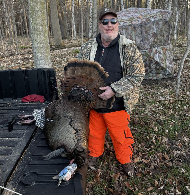 Bob Schuh shows the 20-pound tom he harvested on the first day of the second turkey season. The tom had three beards (8.5 inches, 4.5 inches and 4 inches) and 7/8-inch spurs. The tom was taken on Schuh’s land near Kellnersville.