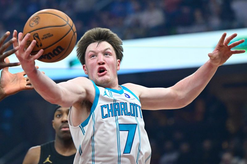 Charlotte Hornets guard Kon Knueppel (7) rebounds in the first quarter against the Cleveland Cavaliers at Rocket Arena on Dec. 14, 2025.