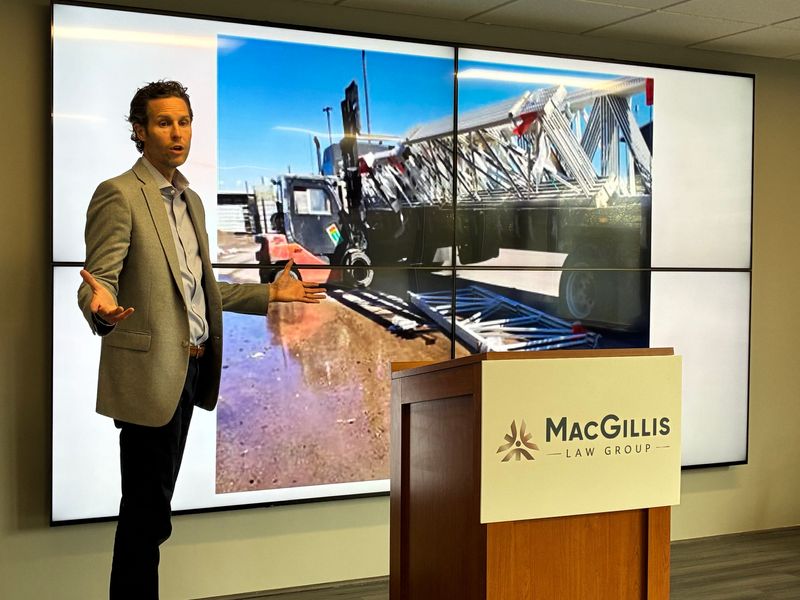 Attorney Chris MacGillis presents a photo of a forklift incident at a Menards distribution center that led to a worker being injured. The jury ruled Menards was at fault and should pay the worker $5.5 million.
