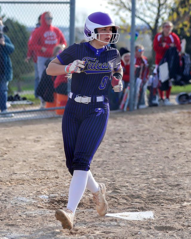 Sheboygan Falls’ Cora Kroeplien (0) arrives at home plate against Valders, Tuesday, April 28, 2026, in Valders, Wis.
