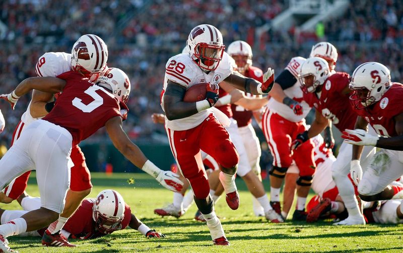Wisconsin Montee Ball (28) scores a touchdown on this run during the 99th Rose Bowl game between the University of Wisconsin and Stanford University, Tuesday, January 1, 2013. The Wisconsin Badgers play Stanford University on January 1, 2013 in the 99th Rose Bowl game. Journal Sentinel Photo by Rick Wood/RWOOD@JOURNALSENTINEL.COM