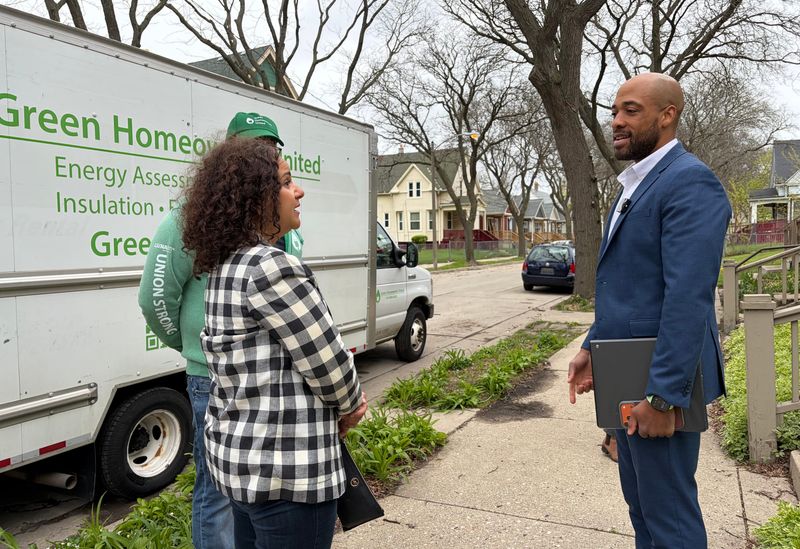 Democratic candidate for governor Mandela Barnes visits a Milwaukee home where workers with Green Homeowners United were doing a basement project aimed at lowering energy bills, on April 29, 2026.