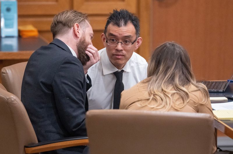 California attorney and animal rights activist Wayne Hsiung, center, appears in Dane County Court on April 29, 2026 in Madison, Wisconsin.