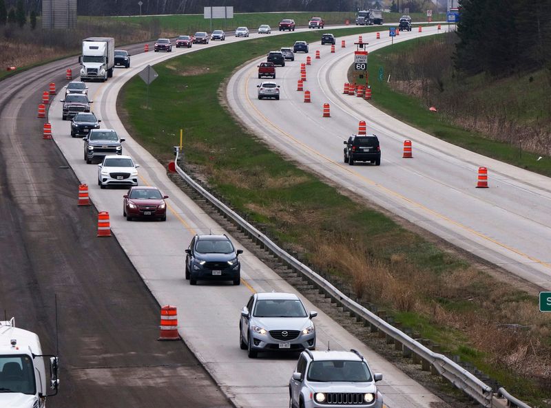 Motorists travel along Interstate 43 which has been reduced to single lanes in places as crews work to renovate the road surface and do needed bridge repairs, Monday, April 27, 2026 in Sheboygan, Wis.