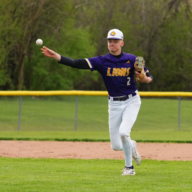 New Berlin Eisenhower shortstop Charlie Wait (2) throws out a runner headed to first during the game against Greendale at New Berlin Eisenhower High School on Wednesday, April 29, 2026, in New Berlin, Wisconsin.