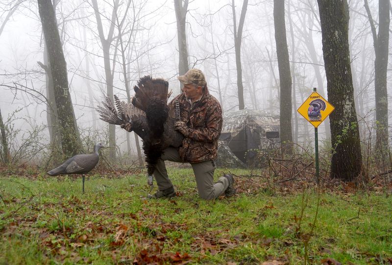 Outdoors editor Paul A. Smith holds a jake, or 1-year-old male wild turkey, he shot while hunting near Eastman, Wis. during the first period of the 2026 Wisconsin spring turkey hunting season.