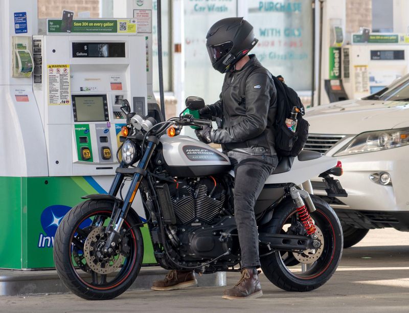 Carl Vandervort, of Milwaukee fills up his motorcycle at a BP gas station for $4.69 on the corner of West Highland Avenue and North 12th Street in Milwaukee, on April 30, 2026. Vandervort filled up his tank for $15.59.