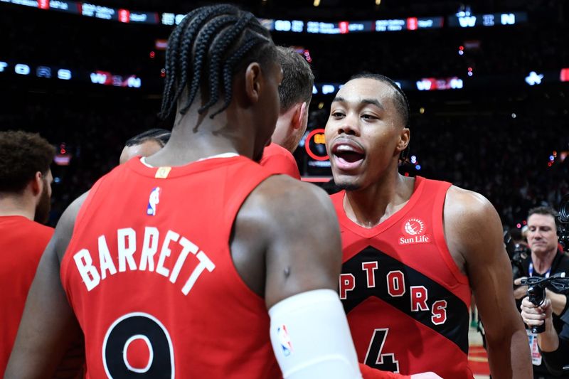 Apr 26, 2026; Toronto, Ontario, CAN; Toronto Raptors forward Scottie Barnes (4) celebrates with forward RJ Barrett (9) after a win over the Cleveland Cavaliers in game four of the first round of the 2026 NBA Playoffs at Scotiabank Arena. Mandatory Credit: Dan Hamilton-Imagn Images