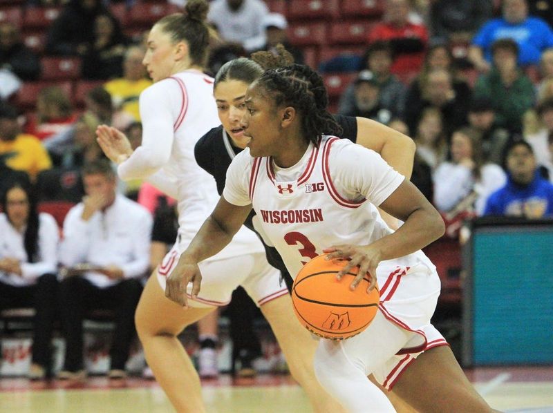 Wisconsin guard Breauna Ware (3) drives past UW-Milwaukee's Micayla Silas during the first half of the Badgers' 75-46 victory over the Panthers Nov. 10, 2025 at the Kohl Center in Madison, Wisconsin.