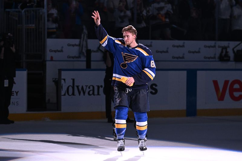 Mar 26, 2026; St. Louis, Missouri, USA; St. Louis Blues left wing Dylan Holloway (81) acknowledges fans after being named the first star of the game after beating the San Jose Sharks at Enterprise Center. Mandatory Credit: Joe Puetz-Imagn Images