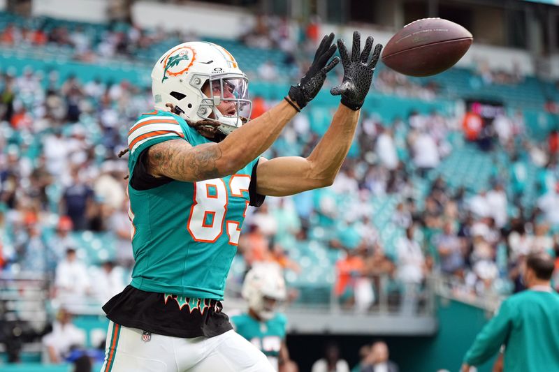 Dec 24, 2023; Miami Gardens, Florida, USA; Miami Dolphins wide receiver Chase Claypool (83) warms up prior to the game against the Dallas Cowboys at Hard Rock Stadium. Mandatory Credit: Jasen Vinlove-USA TODAY Sports