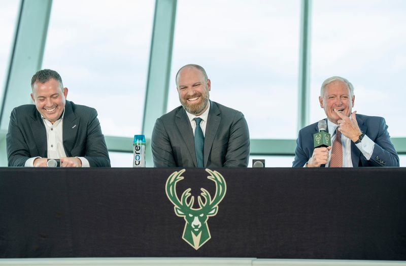 Milwaukee Bucks general manager Jon Horst, from left, new head coach Taylor Jenkins and team co-owner Jimmy Haslam appear at a press conference announcing Jenkins as the Bucks’ new head coach on Wednesday May 6, 2026 at the Milwaukee Art Museum in Milwaukee, Wisconsin.
