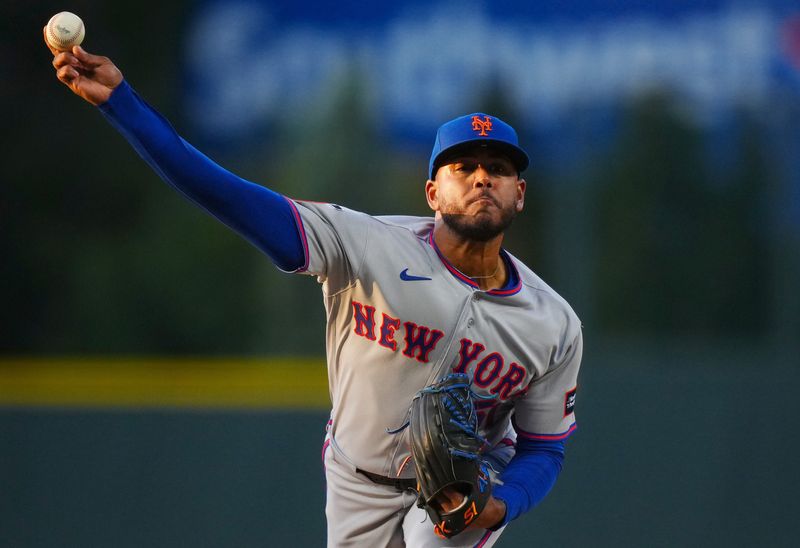 New York Mets starting pitcher Freddy Peralta (51) delivers a pitch against the Colorado Rockies in the first inning on May 6, 2026, at Coors Field.