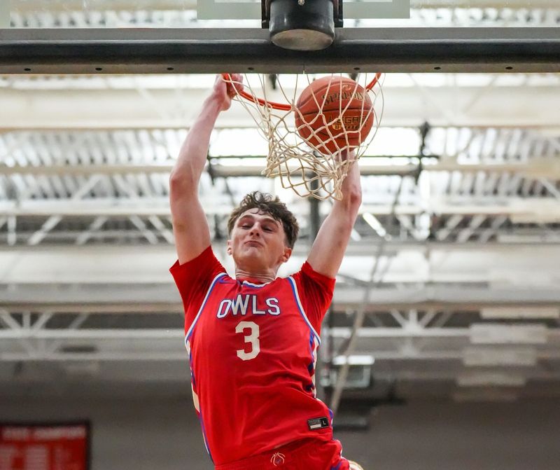 Slinger's Jack Kohnen (3) dunks during the WIAA D2 sectional semifinal game against Port Washington at Cedarburg High School in Cedarburg, Wisconsin, March 12, 2026. Slinger won the game, 62-33.