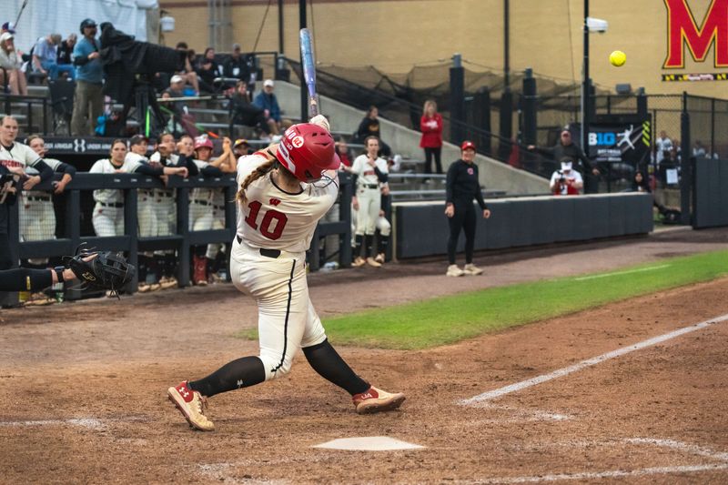 Jaclyn Showalter of the Wisconsin softball team drives a ball against Purdue in the Big Ten Tournament on May 6, 2026. Showalter homered against the Boilermakers to tie the game and added another blast in an upset of Oregon one day later.
