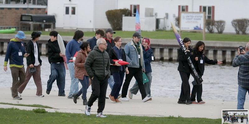 Rockets for Schools students walk to the check in for the launch pad, Saturday, May 9, 2026, in Sheboygan, Wis.