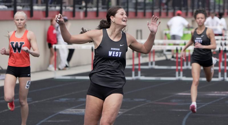 Oshkosh West’s Sydnee Nelson wins her 100 meter hurdles heat with a time of 14.14 during the Myrhum Invitational Saturday, May 9, 2026 at Arrowhead High School in the Town of Merton, Wisconsin.