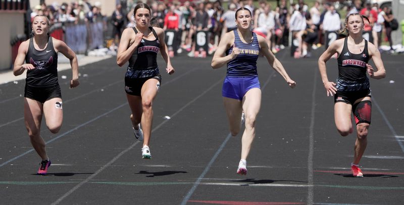 Mukwonago’s Laela Presendofer wins her 100-meter heat during the Myrhum Invitational on May 9 in the Town of Merton. Also shown are Holmen’s Lydia Lazarescu, left, Arrowhead’s Avery Bott and Arrowhead’s Payton Eicher, right.