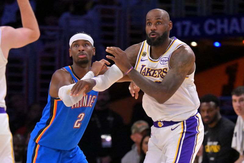 May 9, 2026; Los Angeles, California, USA; Oklahoma City Thunder guard Shai Gilgeous-Alexander (2) defends Los Angeles Lakers forward LeBron James (23) in the second half of game three of the second round of the 2026 NBA Playoffs at Crypto.com Arena. Mandatory Credit: Jayne Kamin-Oncea-Imagn Images