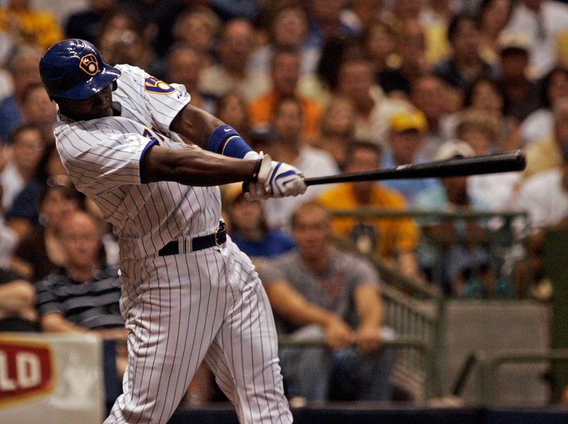 Bill Hall smacks a pinch hit double to drive in 2 runs in the 6th inning against the Cincinnati Reds at Miller Park Friday, July 11, 2008.