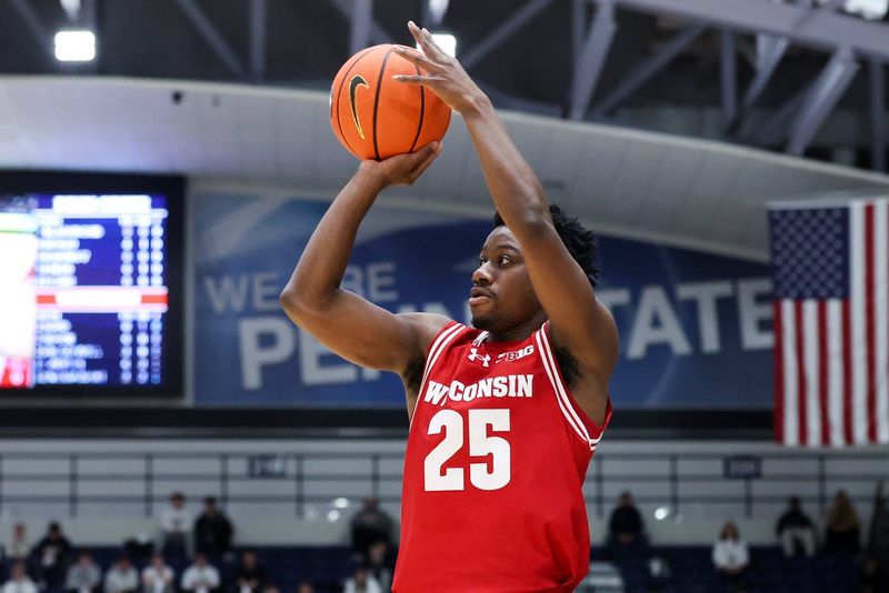 Jan 22, 2026; University Park, Pennsylvania, USA; Wisconsin Badgers guard John Blackwell (25) attempts a three-point shot during the first half against the Penn State Nittany Lions at Rec Hall. Mandatory Credit: Matthew O'Haren-Imagn Images