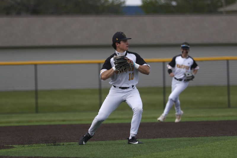 Waupun's Grahm Gopalan makes a throw to first base against Lake Mills on Tuesday, May 12, 2026. Waupun beat Lake Mills, 9-4.