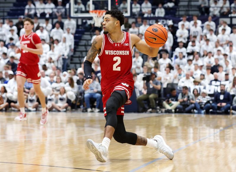 Jan 22, 2026; University Park, Pennsylvania, USA; Wisconsin Badgers guard Nick Boyd (2) drives during the first half against the Penn State Nittany Lions at Rec Hall. Mandatory Credit: Matthew O'Haren-Imagn Images