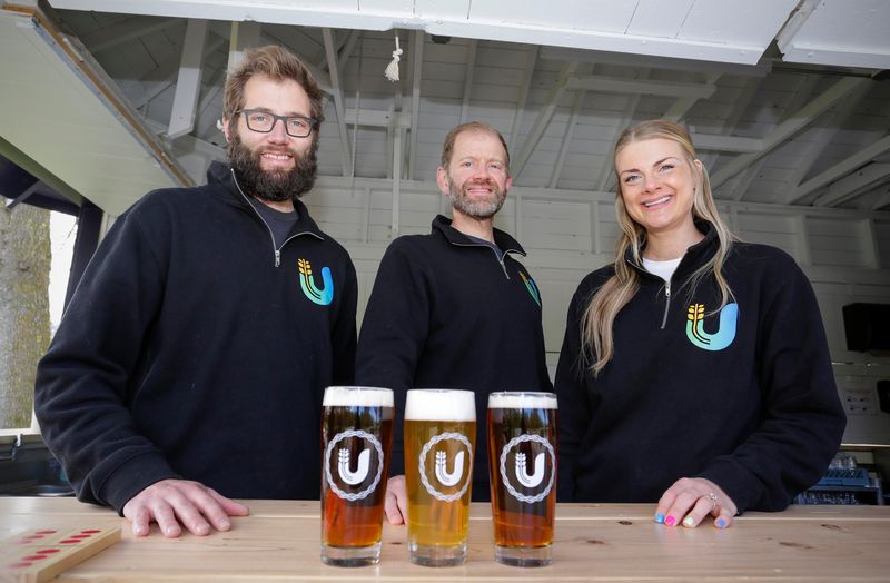 The Tributary Beer Garden opens soon at Kiwanis Park in Sheboygan, Wisconsin. Posing with beers from left, Director of Operations Jake Bray, Director of Marketing John Bray and Director of Events and Outings Jessica Bray, as seen Wednesday, May 13, 2026.