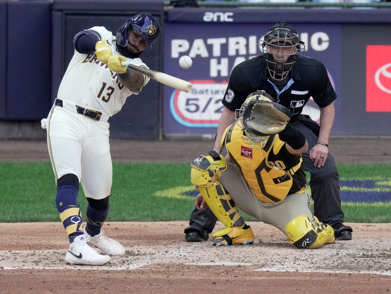 Milwaukee Brewers third baseman Luis Rengifo (13) hits an RBI single during the fourth inning of their game against the San Diego Padres Thursday, May 14, 2026 at American Family Field in Milwaukee, Wisconsin.



Mark Hoffman/Milwaukee Journal Sentinel