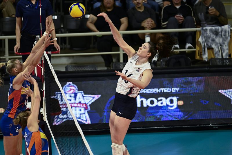 Jul 10, 2024; Long Beach, California, USA; Dana Rettke (16) of the USA spikes the ball against the Netherlands at The Walter Pyramid. during the USA Volleyball Cup at The Walter Pyramid. The USA defeated the Netherlands 3 -2 in a tuneup for the upcoming Paris Olympics. Mandatory Credit: Robert Hanashiro-USA TODAY Sports