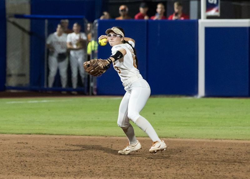 Jun 6, 2025; Oklahoma City, OK, USA; Texas Longhorns utility Leighann Goode (43) throws to first to make the final out in the game in the seventh inning against the Texas Tech Red Raiders to win the National Championship 10-4 in game three of the NCAA Softball Women's College World Series finals at Devon Park. Mandatory Credit: Brett Rojo-Imagn Images