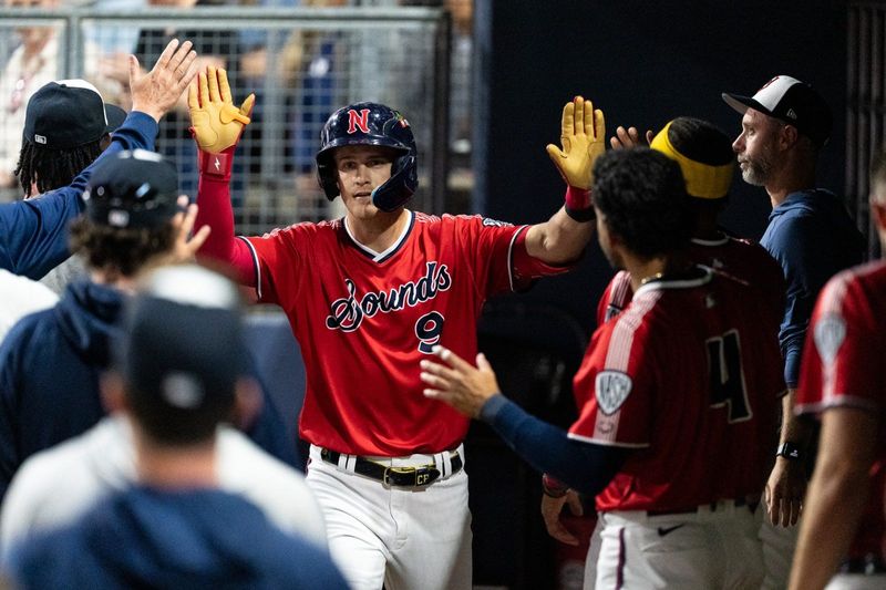 Cooper Pratt gets high-fives from his Nashville Sounds teammates following a home run May 15, 2026. The shortstop is on the Brewers 40-man roster.