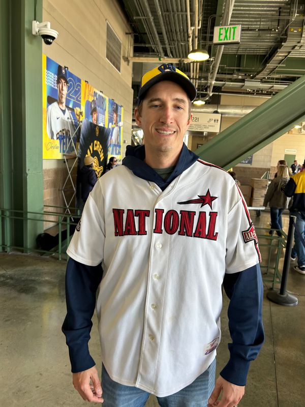 Brewers fan Jon McCabe wears his 2004 Dan Kolb All-Star Game jersey during a game at American Family Field.