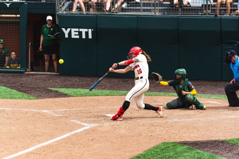 Wisconsin softball player Hannah Conger hits a walk-off double in the ninth inning of the Badgers' extra-inning win over Baylor on May 15 in the first round of the NCAA Tournament in Austin, Texas.