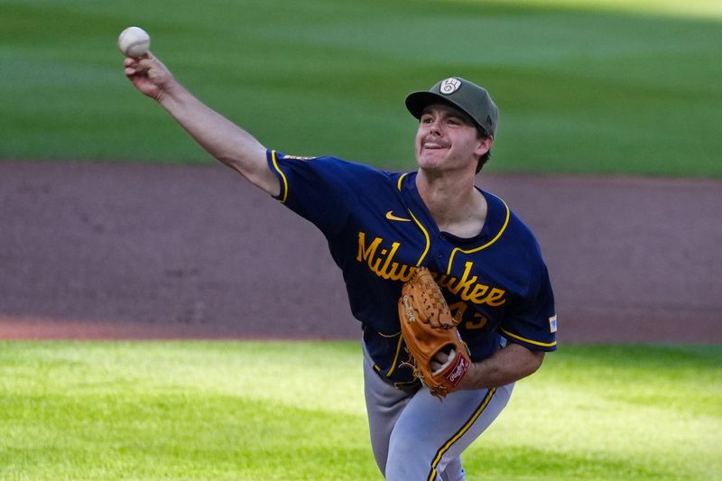 May 16, 2026; Minneapolis, Minnesota, USA; Milwaukee Brewers starting pitcher Logan Henderson (43) throws to the Minnesota Twins in the first inning at Target Field. Mandatory Credit: Bruce Kluckhohn-Imagn Images