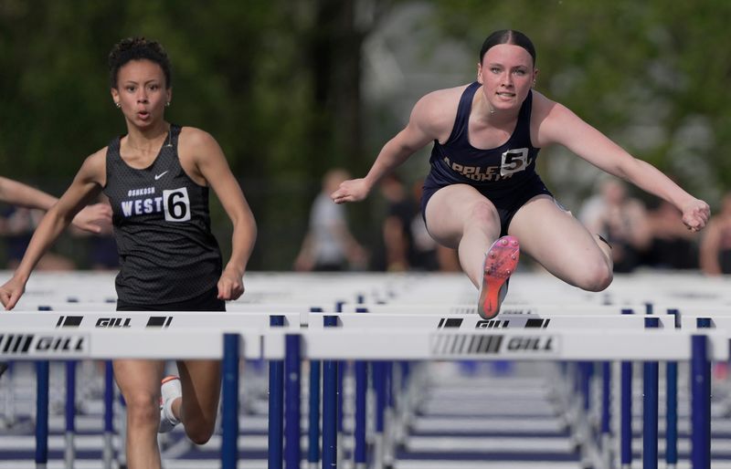 Appleton North's Ashley Parrish competes in the 100-meter hurdles during the Fox Valley Association track and field championships May 18 at Lawrence University.