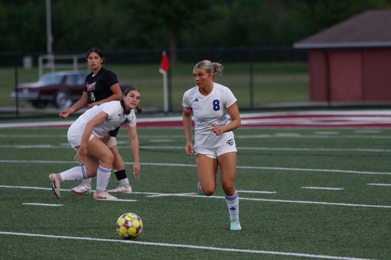 Oshkosh West's Elaina Butz looks to pass against Fond du Lac at Cardinal Stadium on Monday, May 19, 2026. Oshkosh West beat Fond du Lac, 1-0.