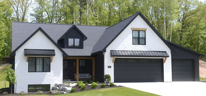 Former Green Bay Packers coach Derrick Ainsley listed his house in Hobart, shown on May 22, for $1.1 million.