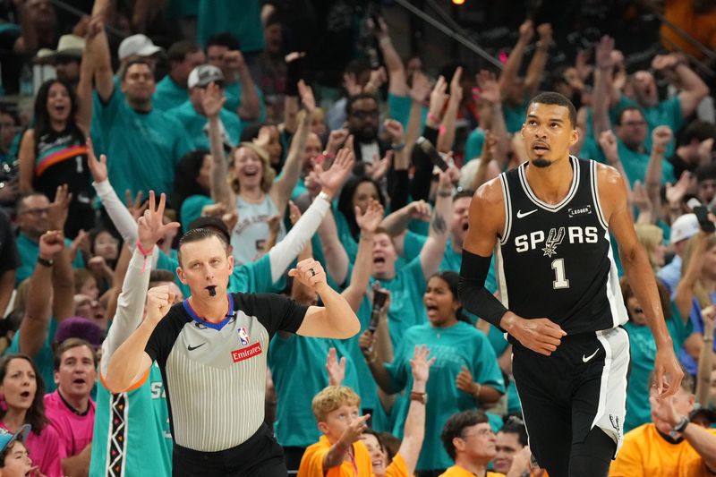 May 22, 2026; San Antonio, Texas, USA; San Antonio Spurs forward Victor Wembanyama (1) reacts against the Oklahoma City Thunder in the first half during game three of the western conference finals for the 2026 NBA playoffs at Frost Bank Center. Mandatory Credit: Scott Wachter-Imagn Images
